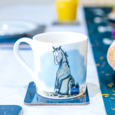 "Fine Bone China mug by Emily Cole featuring a playful horse design and the text 'My Favorite Client.