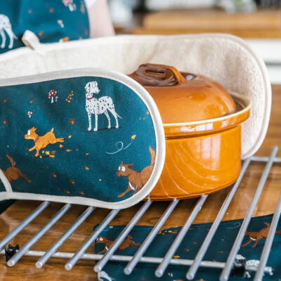 Teal oven gloves with Dalmatian, Terrier and Collie cross brown dog