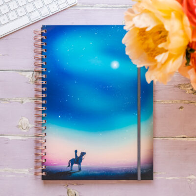 'Starry Sky' hardback horse notebook. Featuring a horse and rider looking up at a beautiful starry sky aroura.