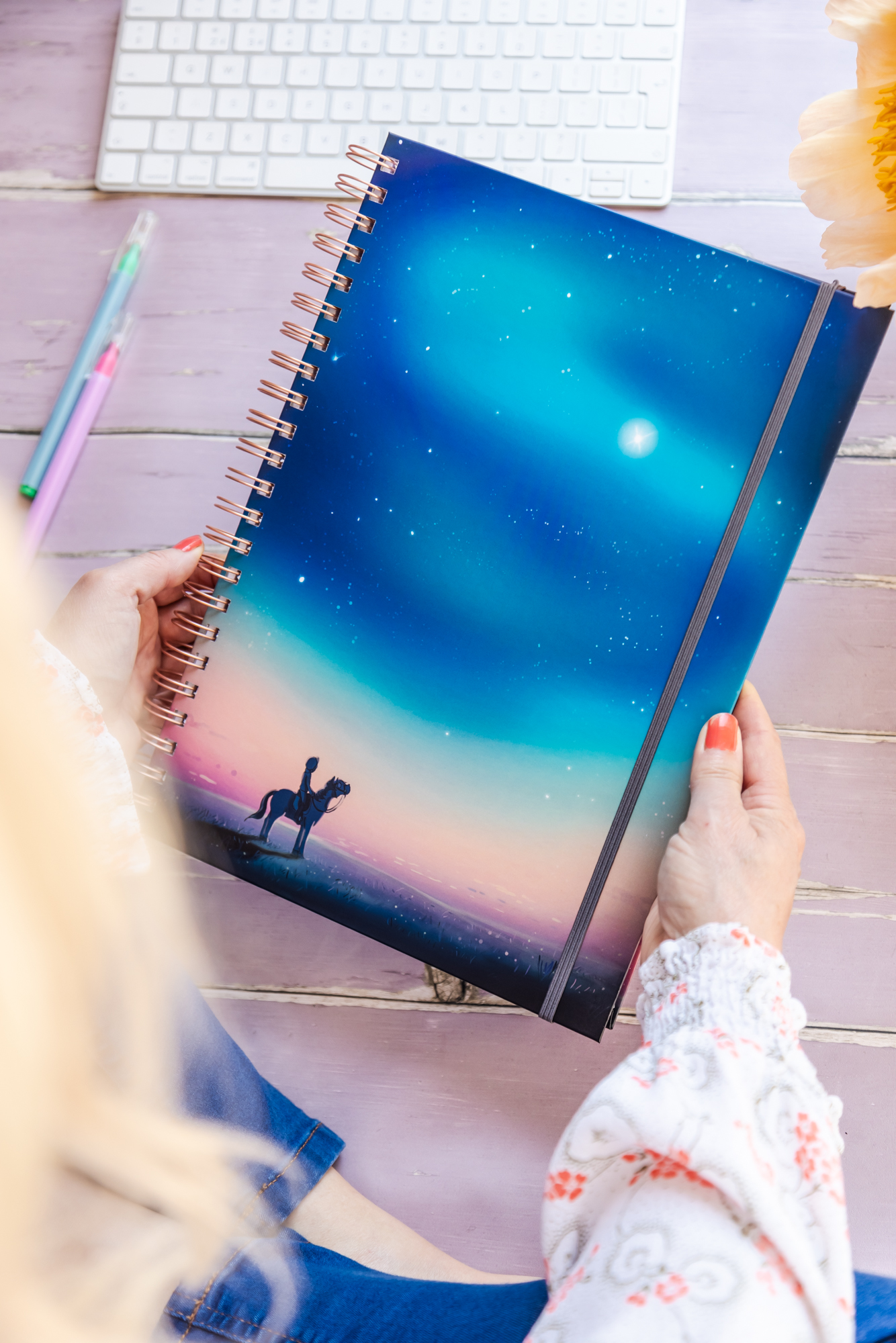A4 'Starry Sky' hardback horse notebook. Featuring a horse and rider looking up at a beautiful starry sky aroura.