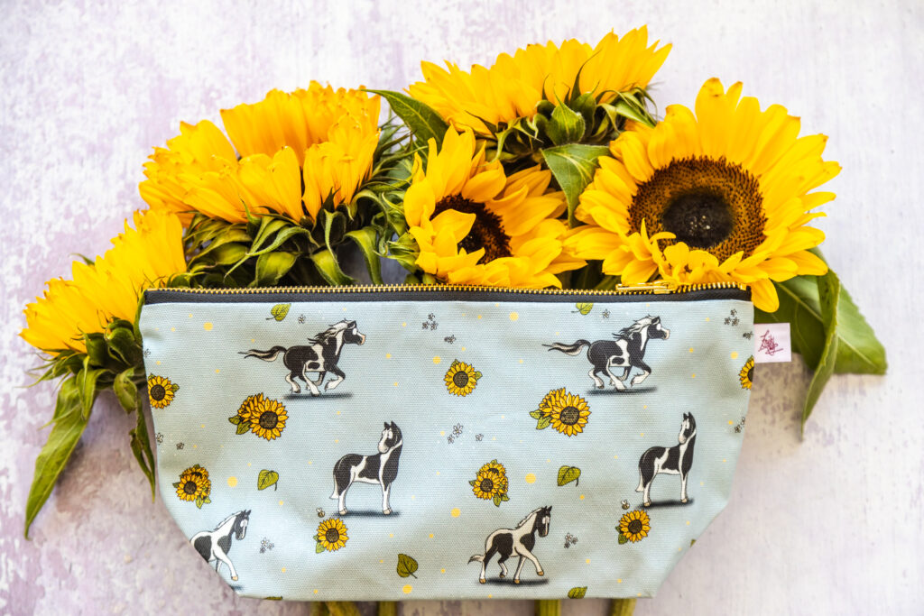 Decorated with Sunflowers a Piebald Horse Pattern Washbag, Hogged Piebald Horse, Piebald Cob and Piebald Sport Horses, with Sunflower detailing.